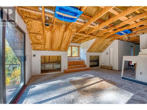 primary - 8726 Forsberg Road, Vernon, BC - Indoor Photo Showing Other Room With Fireplace