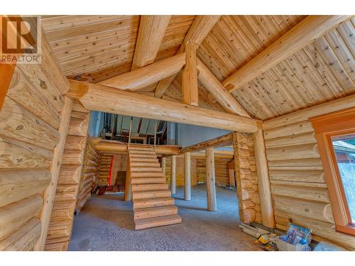 construction stairs - new stairs in shop - 8726 Forsberg Road, Vernon, BC - Indoor Photo Showing Other Room