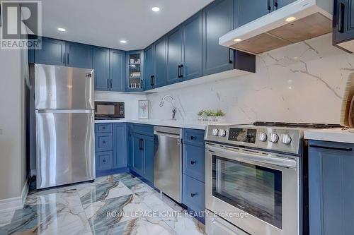 506 - 10 Dean Park Road, Toronto, ON - Indoor Photo Showing Kitchen