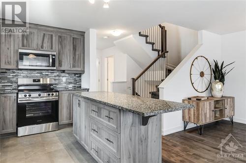 Model Home at 325 Dion - 728 Mathieu Street, Rockland, ON - Indoor Photo Showing Kitchen With Upgraded Kitchen