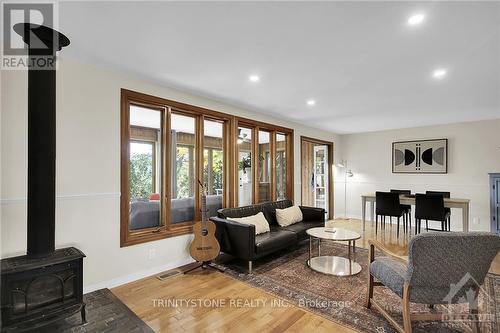 6442 First Line Road, Ottawa, ON - Indoor Photo Showing Living Room With Fireplace