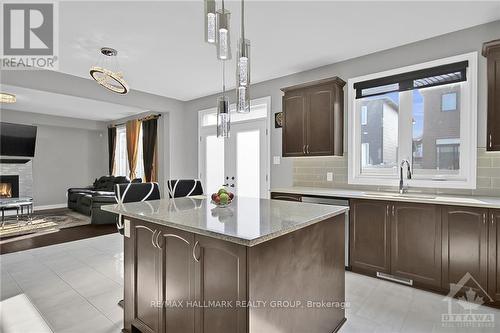 302 Eaglehead Crescent, Ottawa, ON - Indoor Photo Showing Kitchen With Fireplace With Double Sink