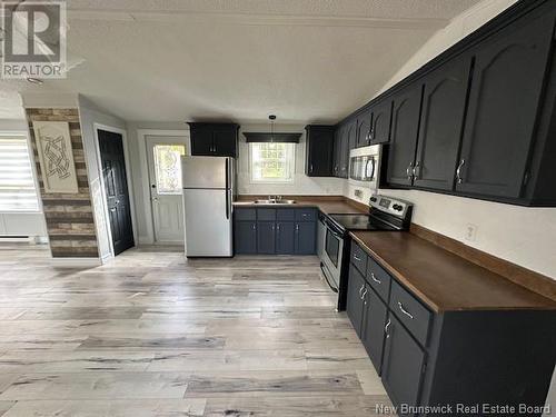 20 Maple Green Crescent, Dalhousie Junction, NB - Indoor Photo Showing Kitchen With Double Sink