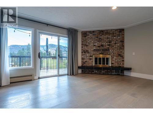 144 Sumac Ridge Drive Unit# 11, Summerland, BC - Indoor Photo Showing Living Room With Fireplace