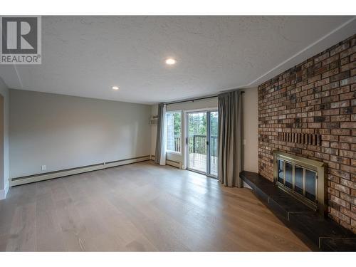 144 Sumac Ridge Drive Unit# 11, Summerland, BC - Indoor With Fireplace