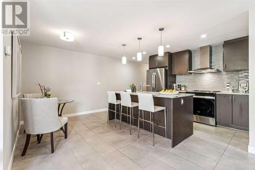 302, 303 13 Avenue Sw, Calgary, AB - Indoor Photo Showing Kitchen With Stainless Steel Kitchen With Upgraded Kitchen