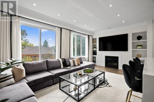 7 Hollyhock Court, Toronto, ON - Indoor Photo Showing Living Room With Fireplace