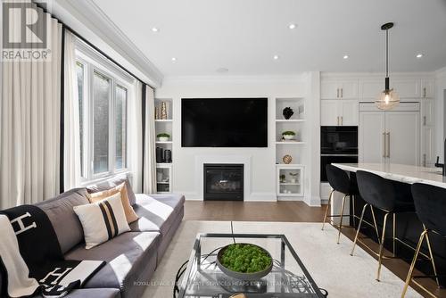 7 Hollyhock Court, Toronto, ON - Indoor Photo Showing Living Room With Fireplace