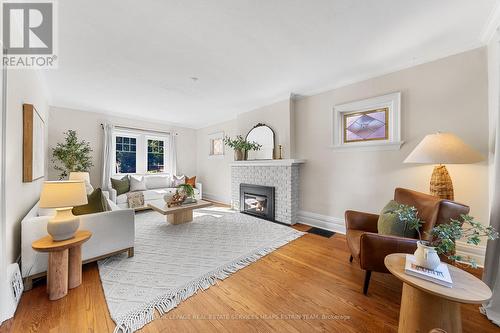 213 St Leonards Crescent, Toronto, ON - Indoor Photo Showing Living Room With Fireplace