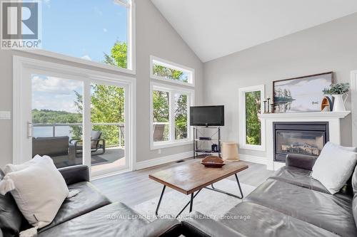 1112 Blue Heron Ridge, Central Frontenac, ON - Indoor Photo Showing Living Room With Fireplace