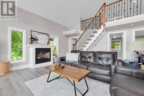 1112 Blue Heron Ridge, Central Frontenac, ON - Indoor Photo Showing Living Room With Fireplace