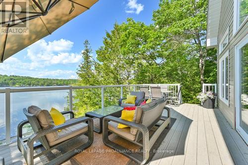 1112 Blue Heron Ridge, Central Frontenac, ON - Outdoor With Body Of Water With Deck Patio Veranda With Exterior