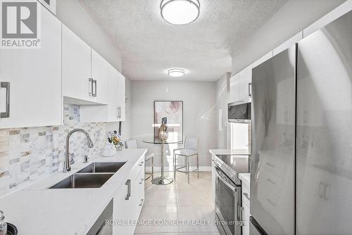 602 - 180 Markham Road, Toronto, ON - Indoor Photo Showing Kitchen With Double Sink With Upgraded Kitchen