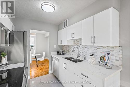 602 - 180 Markham Road, Toronto, ON - Indoor Photo Showing Kitchen With Double Sink With Upgraded Kitchen