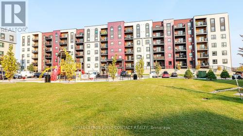 110 - 4 Spice Way, Barrie, ON - Outdoor With Balcony With Facade