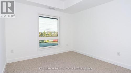 110 - 4 Spice Way, Barrie, ON - Indoor Photo Showing Other Room