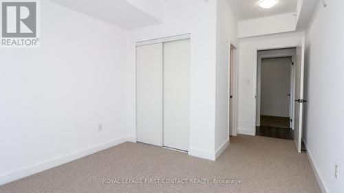 110 - 4 Spice Way, Barrie, ON - Indoor Photo Showing Other Room