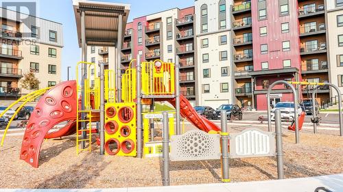 110 - 4 Spice Way, Barrie, ON - Outdoor With Balcony With Facade