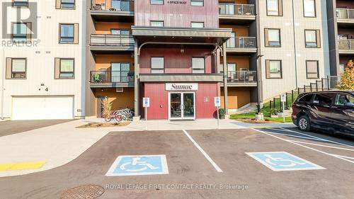 110 - 4 Spice Way, Barrie, ON - Outdoor With Balcony With Facade