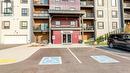 110 - 4 Spice Way, Barrie, ON  - Outdoor With Balcony With Facade 