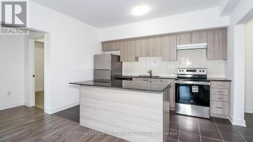 110 - 4 Spice Way, Barrie, ON - Indoor Photo Showing Kitchen