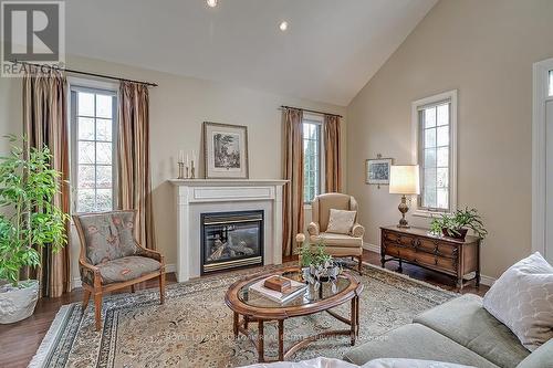 1 - 2141 Caroline Street, Burlington, ON - Indoor Photo Showing Living Room With Fireplace