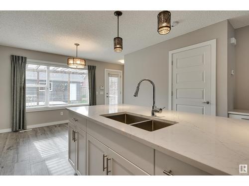 16009 10 Av Sw Sw, Edmonton, AB - Indoor Photo Showing Kitchen With Double Sink