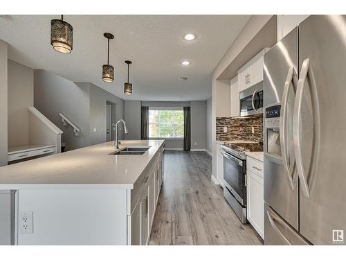 16009 10 Av Sw Sw, Edmonton, AB - Indoor Photo Showing Kitchen With Double Sink With Upgraded Kitchen