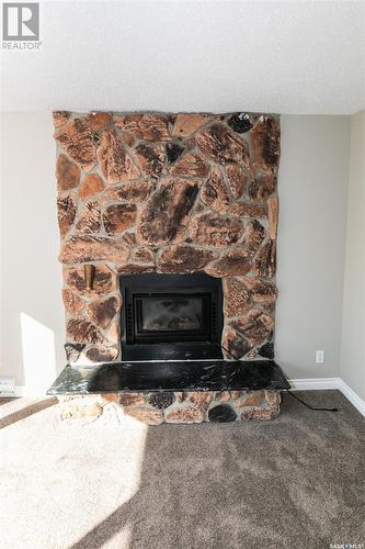 Kruesel Acreage, Winslow Rm No. 319, SK - Indoor Photo Showing Living Room With Fireplace