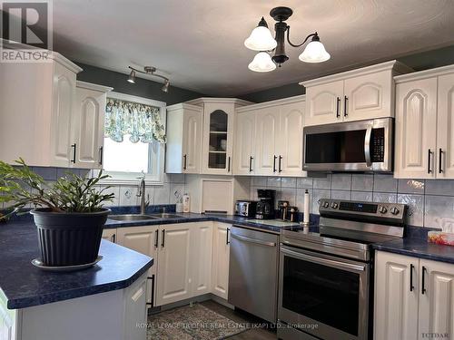 552 Government Road E, Kapuskasing, ON - Indoor Photo Showing Kitchen With Double Sink