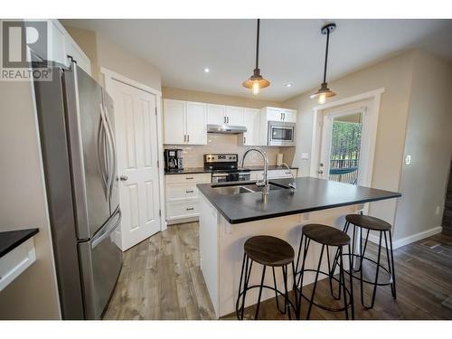 228 Shadow Mountain  Boulevard, Cranbrook, BC - Indoor Photo Showing Kitchen With Stainless Steel Kitchen With Double Sink