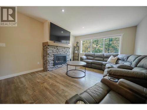 228 Shadow Mountain  Boulevard, Cranbrook, BC - Indoor Photo Showing Living Room With Fireplace