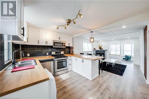 43 Adair Avenue S, Hamilton, ON - Indoor Photo Showing Kitchen With Double Sink