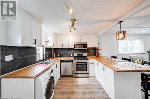 43 Adair Avenue S, Hamilton, ON - Indoor Photo Showing Kitchen With Double Sink