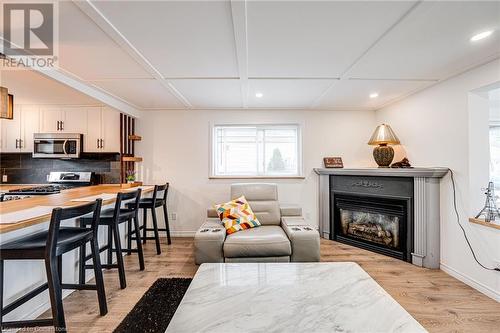 43 Adair Avenue S, Hamilton, ON - Indoor Photo Showing Living Room With Fireplace