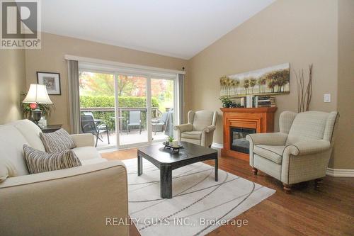 98 Village Crescent, Peterborough (Otonabee), ON - Indoor Photo Showing Living Room With Fireplace