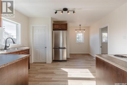 602 9Th Avenue Nw, Moose Jaw, SK - Indoor Photo Showing Kitchen With Double Sink