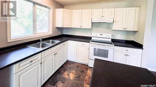 123 T Avenue S, Saskatoon, SK - Indoor Photo Showing Kitchen With Double Sink