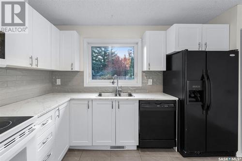 231 Weyakwin Drive, Saskatoon, SK - Indoor Photo Showing Kitchen With Double Sink