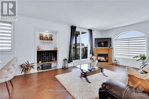 1014 Tanguay Court, Ottawa, ON - Indoor Photo Showing Living Room With Fireplace