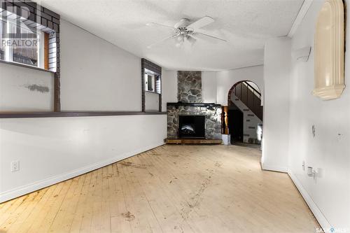 1424 Forget Street, Regina, SK - Indoor Photo Showing Other Room With Fireplace