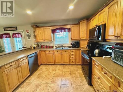 28 Glebe Avenue, Pointe-Du-Chêne, NB - Indoor Photo Showing Kitchen With Double Sink