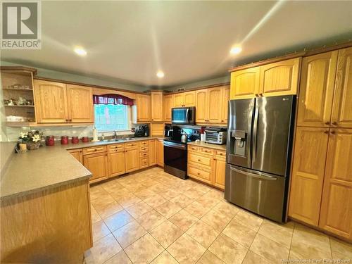 28 Glebe Avenue, Pointe-Du-Chêne, NB - Indoor Photo Showing Kitchen With Double Sink