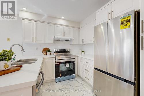 36 Ponymeadow Terrace, Toronto, ON - Indoor Photo Showing Kitchen With Double Sink With Upgraded Kitchen