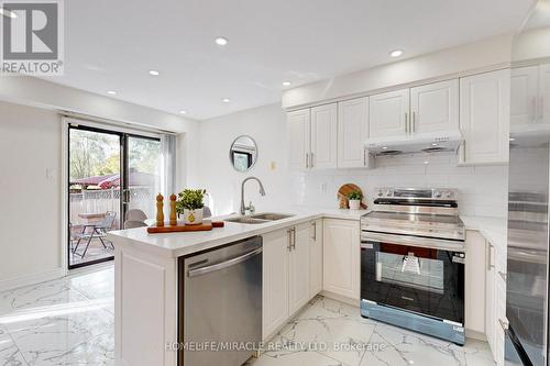 36 Ponymeadow Terrace, Toronto, ON - Indoor Photo Showing Kitchen With Double Sink With Upgraded Kitchen