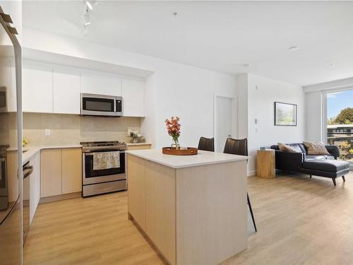 513-1115 Johnson St, Victoria, BC - Indoor Photo Showing Kitchen With Stainless Steel Kitchen