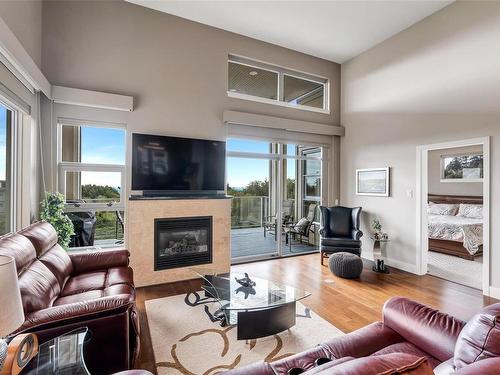 403-3234 Holgate Lane, Colwood, BC - Indoor Photo Showing Living Room With Fireplace