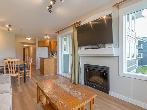 726-1600 Stroulger Rd, Nanoose Bay, BC - Indoor Photo Showing Living Room With Fireplace