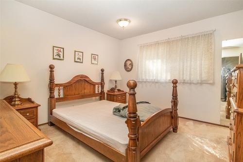 11 Caro Road, Kelowna, BC - Indoor Photo Showing Bedroom