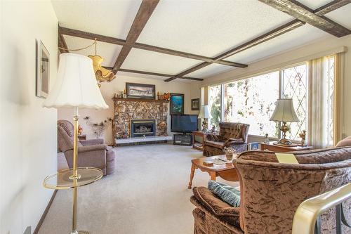 11 Caro Road, Kelowna, BC - Indoor Photo Showing Living Room With Fireplace